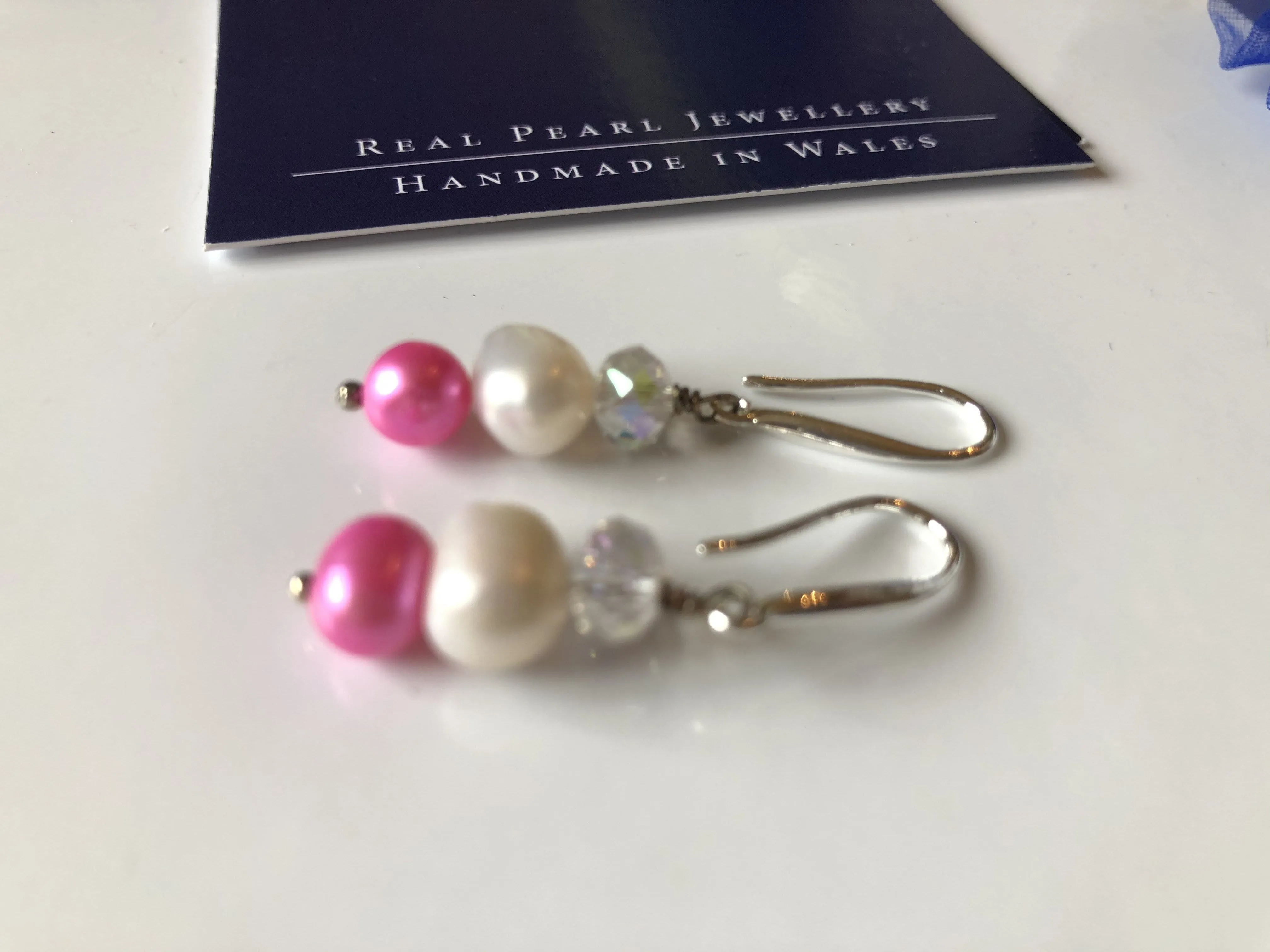 Earrings: Ivory and pink pearl with white crystal drop earrings