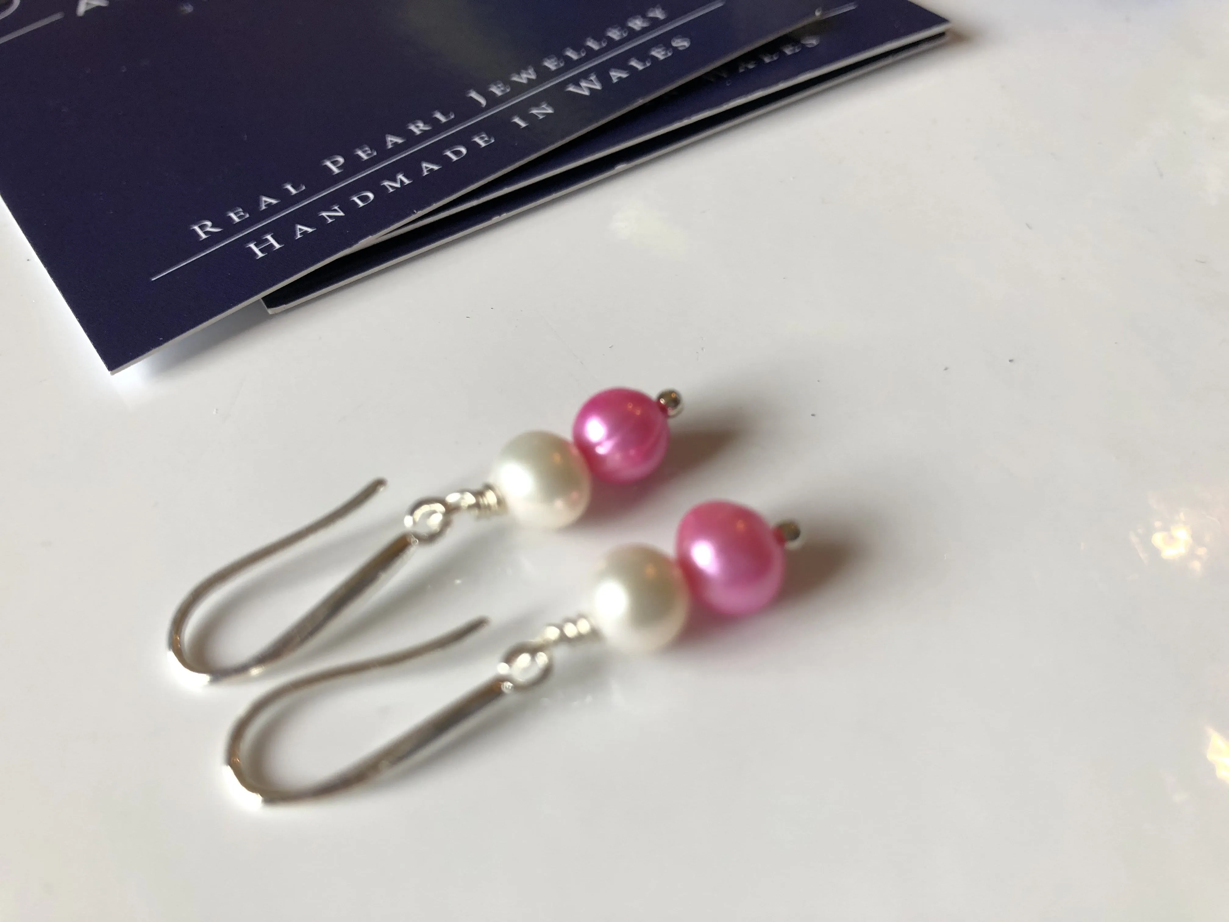 Earrings: Pink and ivory double pearl earrings