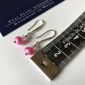 Earrings: Single pink pearl drop earrings